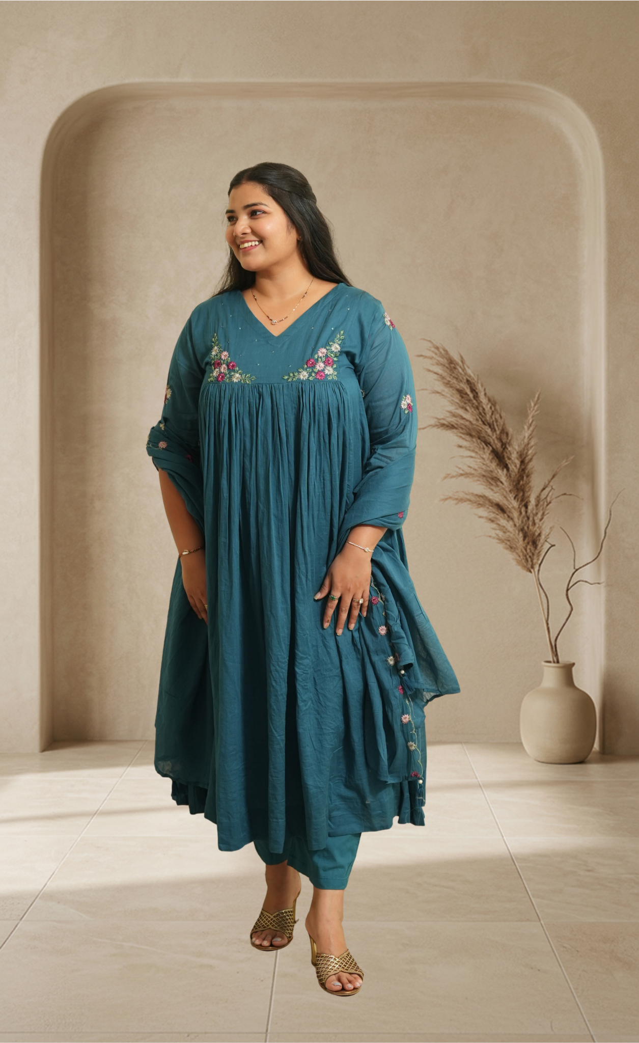 Graceful Teal Blue Suit With Delicate Floral Detailing