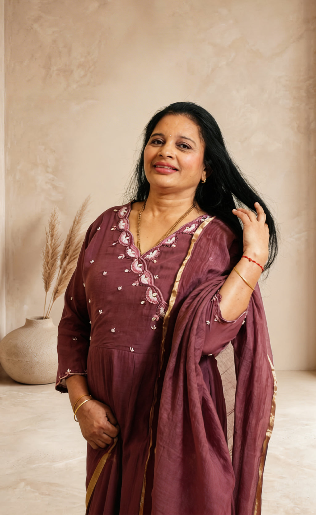 Grceful Festive Charm in a Rich Mauve Ethnic Suit