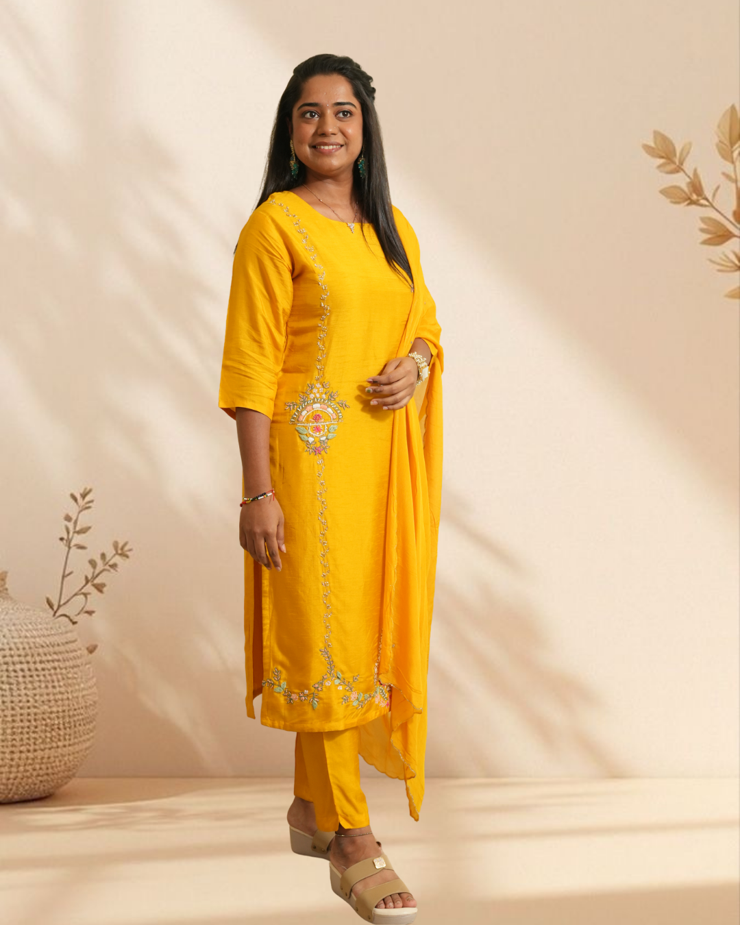 Radiant festive elegance in a vibrant yellow embroidered kurta set
