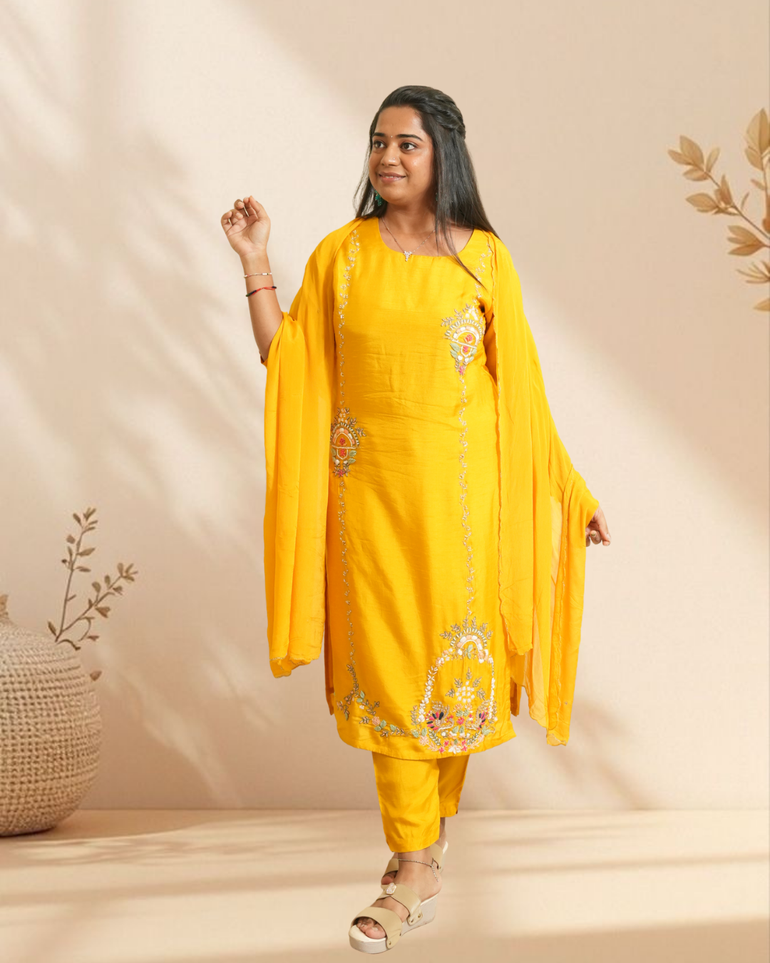 Radiant festive elegance in a vibrant yellow embroidered kurta set
