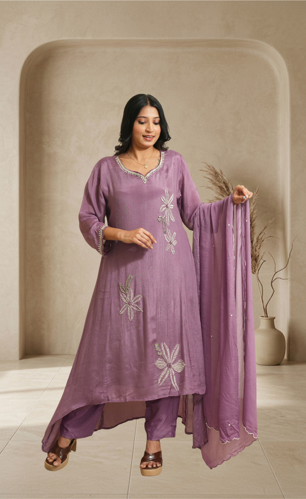 Effortless elegance in a soft lavender kurta set with delicate floral accents