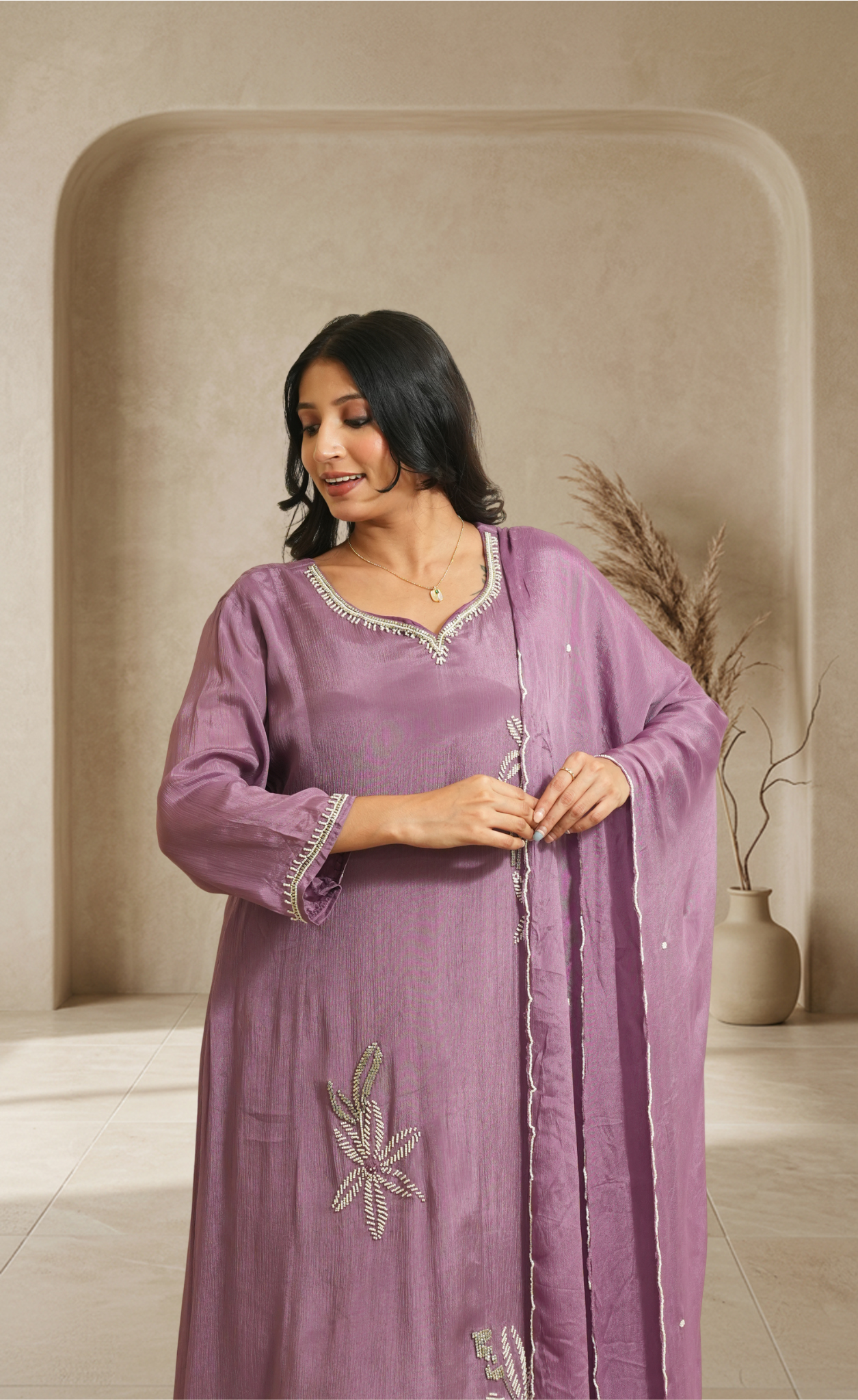 Effortless elegance in a soft lavender kurta set with delicate floral accents