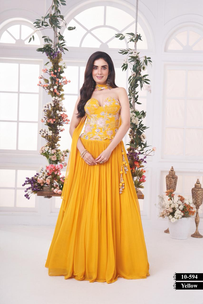 Radiate sunshine elegance with this stunning yellow embroidered lehenga set