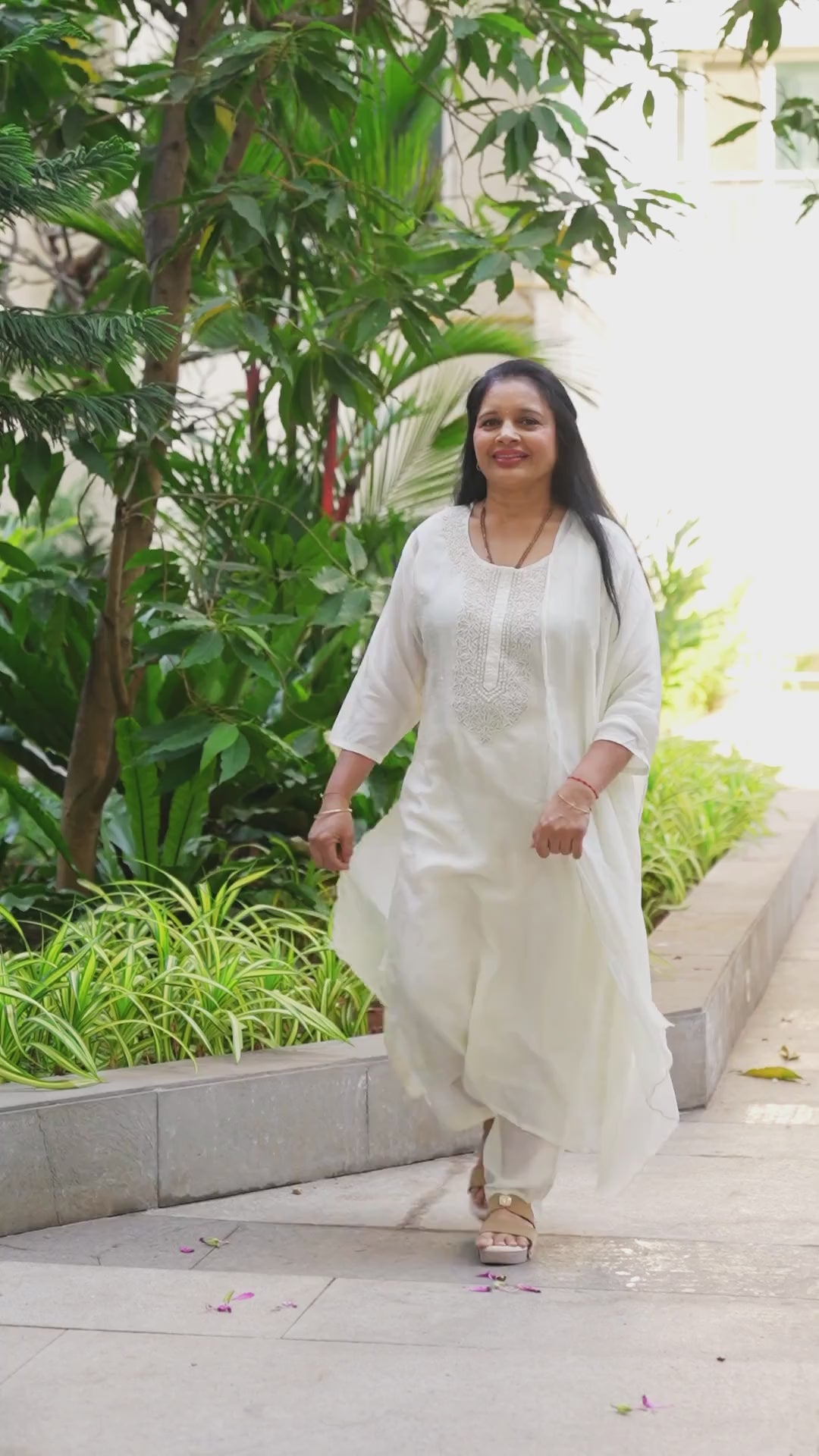 Elegant off-white ethnic set with graceful embroidery for a timeless, minimal look